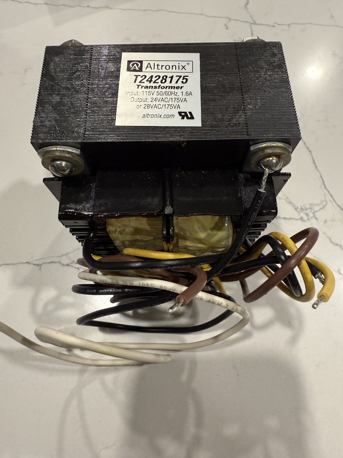 Altronix T2428175 24/28VAC open-frame transformer rated 175VA at 24VAC and 185VA at 28VAC for compatible security equipment.