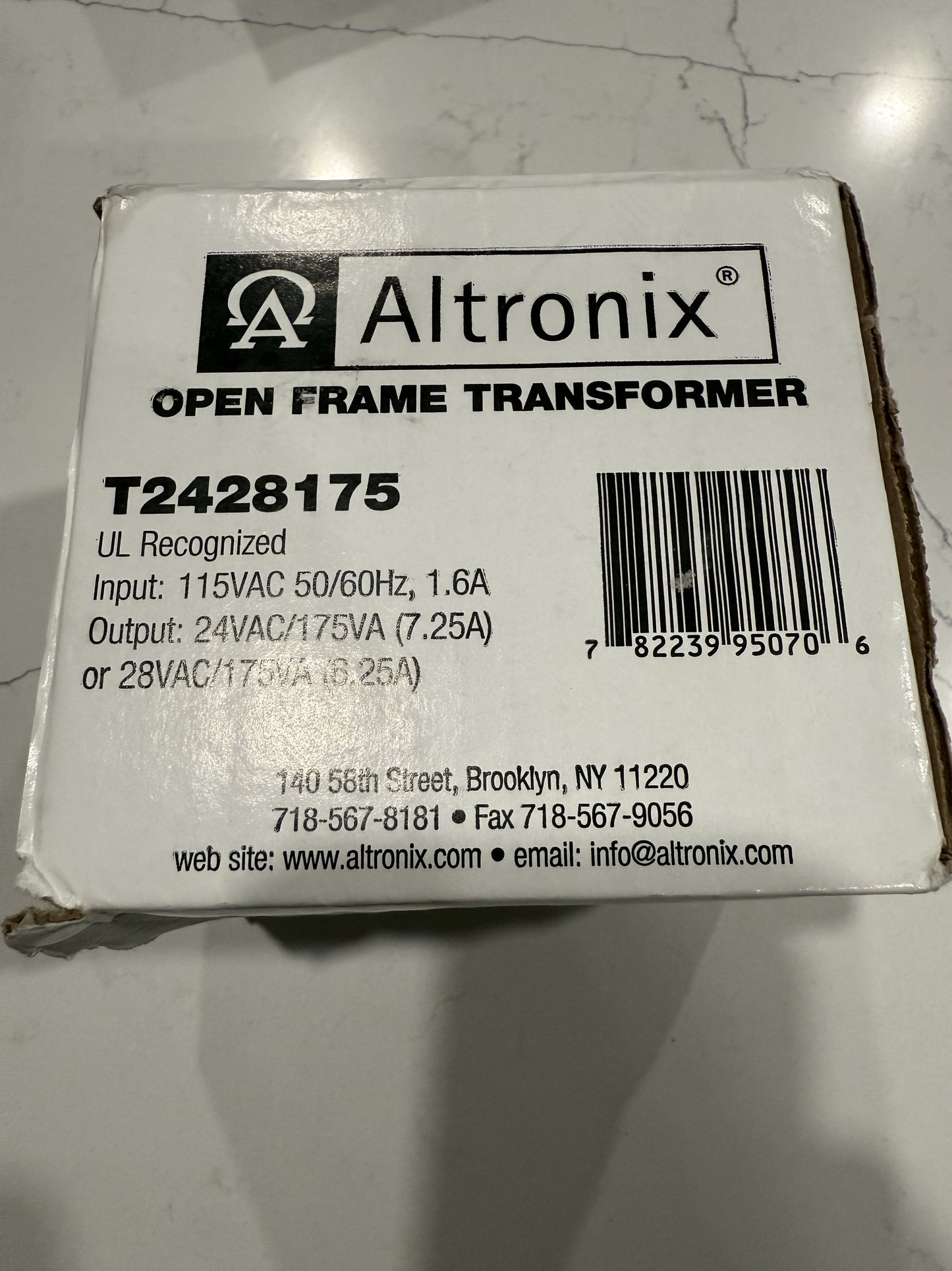 Altronix T2428175 open-frame transformer with 115VAC input and 24VAC 175VA or 28VAC 185VA output for professional low-voltage systems.