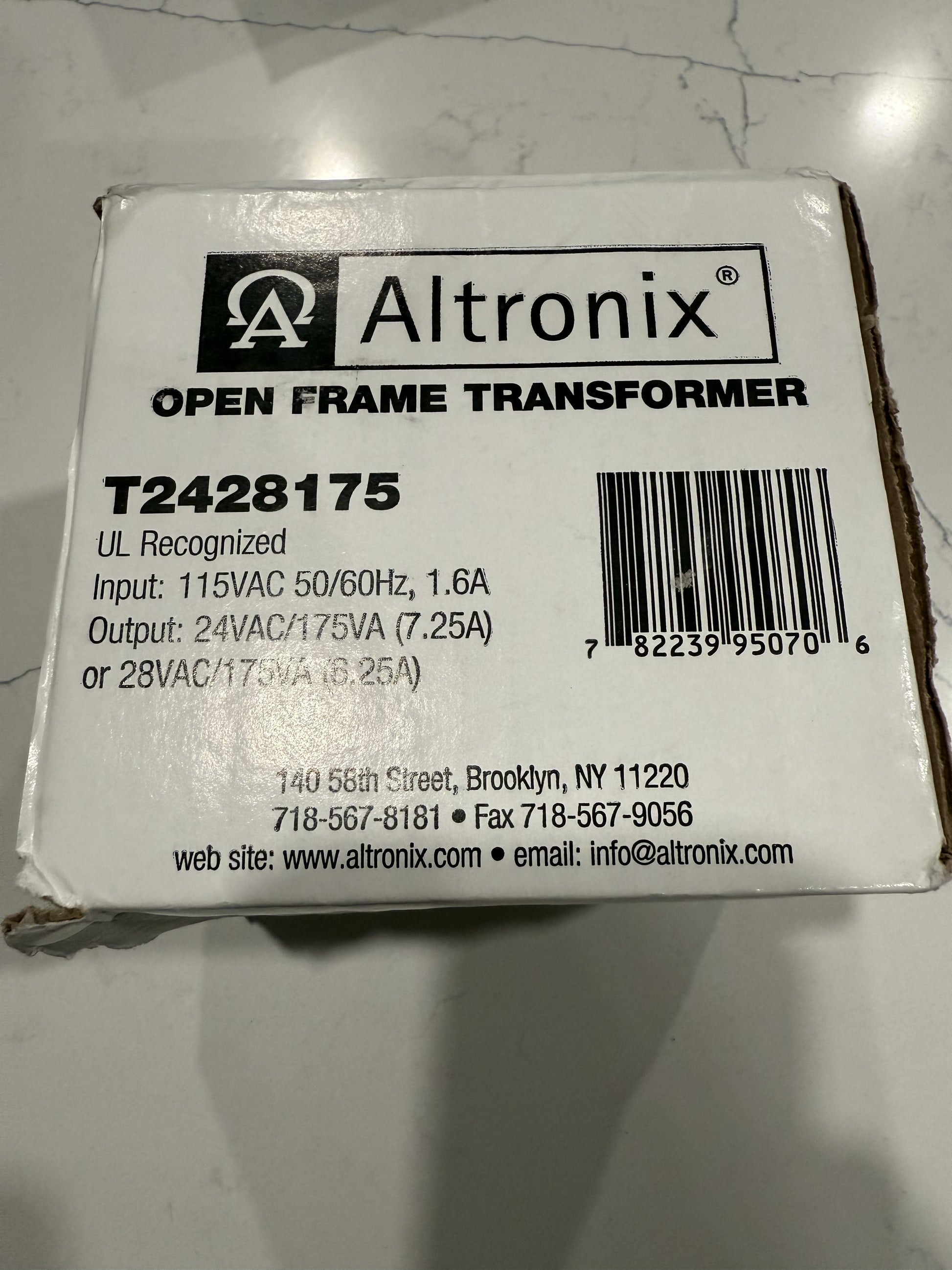 Altronix T2428175 open-frame transformer with 115VAC input and 24VAC 175VA or 28VAC 185VA output for professional low-voltage systems.